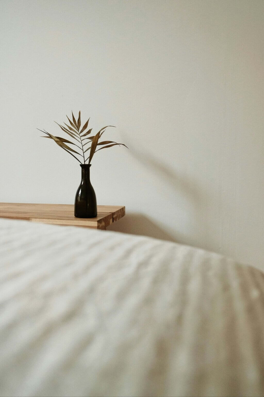 Vase with a palm branch